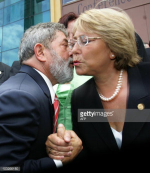 News Photo: Brazilian President Luiz Inacio Lula da Silva kisses…