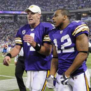 12) talking as they leave the field at the end of the second quarter ...