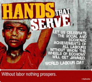 Hands That Serve Labour Day With Many Movable Quotes On Red Table.