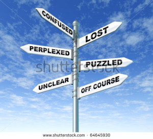 lost and confused sign post directions sky pole uncertainty