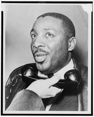 Dick Gregory interviewed on telephone, 1964. Photo Credit: Herman ...