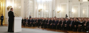 Russian President Vladimir Putin delivers his speech at the Kremlin ...