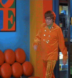 Austin Powers ( Mike Myers ) walks into a room and is shocked during ...