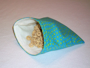 Lucy from Fly Away Home shows you how to make a fabric snack bag .
