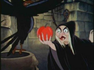 Snow White and the Seven Dwarfs - The Queen holds the poison apple