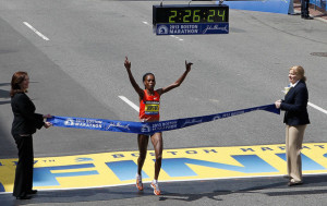 Rita Jeptoo Rita Jeptoo of Kenya crosses the finish line to win the ...