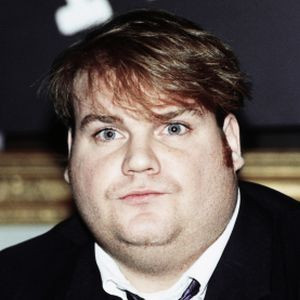 Photo found with the keywords: chris farley air quotes