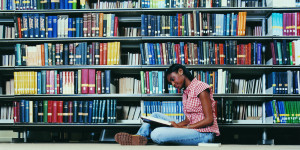 AFRICAN-AMERICAN-WOMAN-READING-BOOK-facebook.jpg