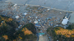 WIRE: A tsunami tidal wave washes away houses in Kesennuma, Miyagi ...