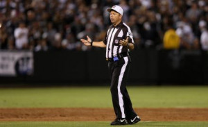 Replacement referee Jim Core questions a call during the season ...