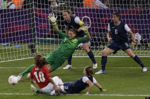 Hope Solo makes a save against Japan during the women's soccer ...
