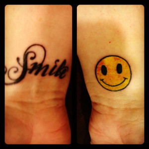 Smile tattoo- or just a smiley face ;)