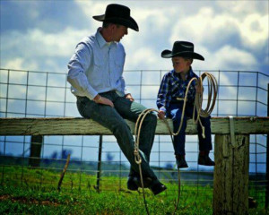 Cute cowboy pose/ like father like son
