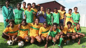 Members of the Mandela Football Club team pose with Zinzi Mandela ...