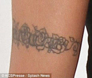 Elisabetta Canalis comes clean about her Eminem tattoo