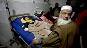 attack on a school receive treatment at a local hospital in Peshawar ...