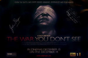 Personal items: This poster of John Pilger's The War You Don't See was ...