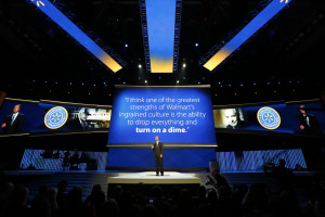 doug-mcmillon-on-stage-in-front-of-sam-walton-quote.jpg