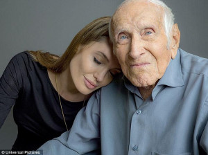 Human dynamo!' War veteran Louis Zamperini poses with Angelina Jolie ...