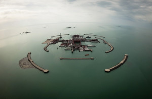 An aerial view shows artificial islands on Kashagan offshore oil ...