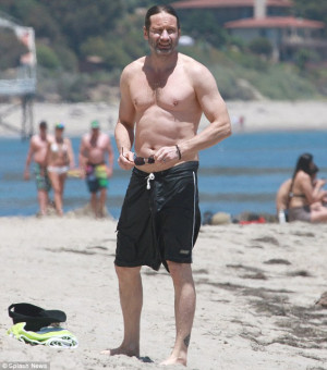 Californ-vacation: David Duchovny showed off his defined abs and toned ...