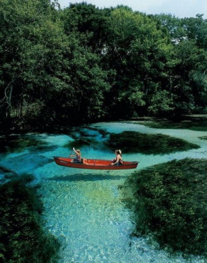 Slovenia. The water is so clear it looks like their boat is floating ...