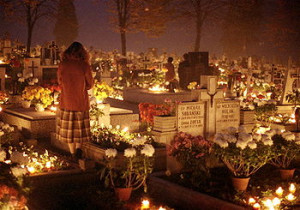 All Saints' Day at a cemetery in O.wi.cim, Poland, 1 November 1984