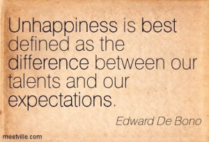 Unhappiness is best defined as the difference between our talents and ...