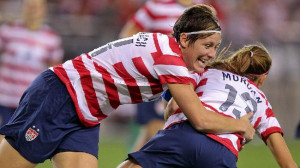 ... celebrate as key members of the U.S. women's soccer team. (AP Photo