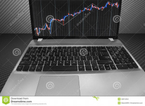Forex graph chart on laptop monitor screen.