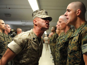 Marine DI (Desert MARPAT) makes a suggestion to a Recruit (Woodland ...