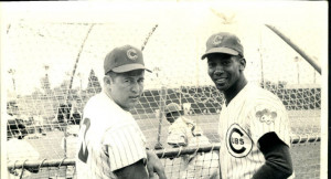 ... with his fellow Hall of Fame teammate Ron Santo in Spring training