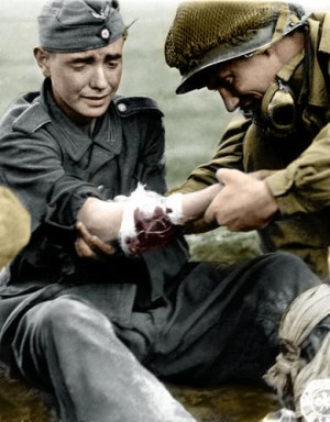 American helping wounded German soldier , 1944 . Army Sur geon General ...