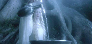 Galadriel pouring water into the mirror.