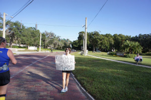 group from lululemon cheering and holding signs. Most were sayings ...