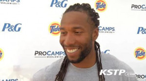 Larry Fitzgerald taking time to give back to kids at his football camp