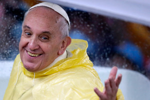 Pope Francis aboard his popemobile reets devotees following a mass at ...