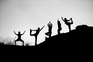 hiking and yoga silhouettes