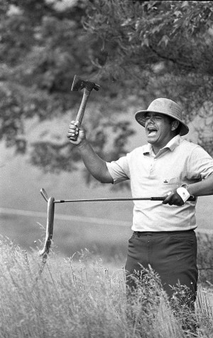 Lee Trevino has a little fun during a practice round in 1971, wearing ...