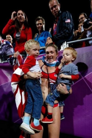 Kerri Walsh Jennings hugs her kids after winning an Olympic gold medal