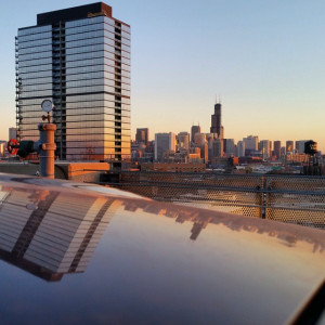 Chicago skyline reflecting off the hood to my #4runner. Such a ...