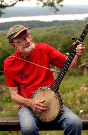 Pete Seeger, then 85, sits on his porch in 2004 above the Hudson River ...