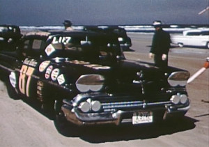 Paul Goldsmith and Jimmy Thompson behind the pace car