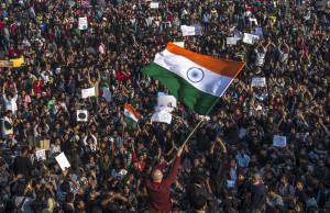 Students chant anti-police slogans during a protest against the Indian ...