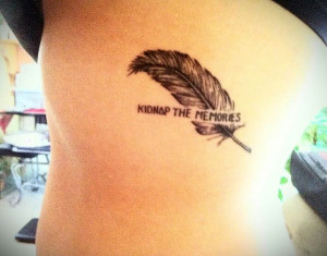 Feather tattoos: left rib 