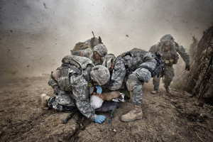Kozyrev / Noor for TIME. #6. Protection U.S. soldiers shield a wounded ...
