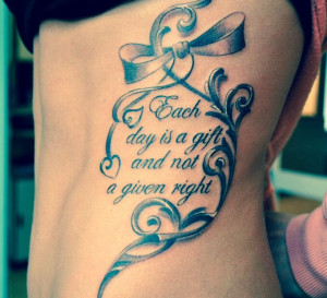 30) Quote Tattoo Idea On Rib