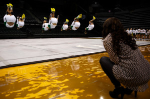 Oregon head coach Felecia Mulkey watches closely as the team does a ...