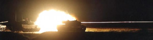German Leopards on a night-time live fire exercise.