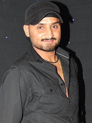 Harbhajan Singh With His Wife